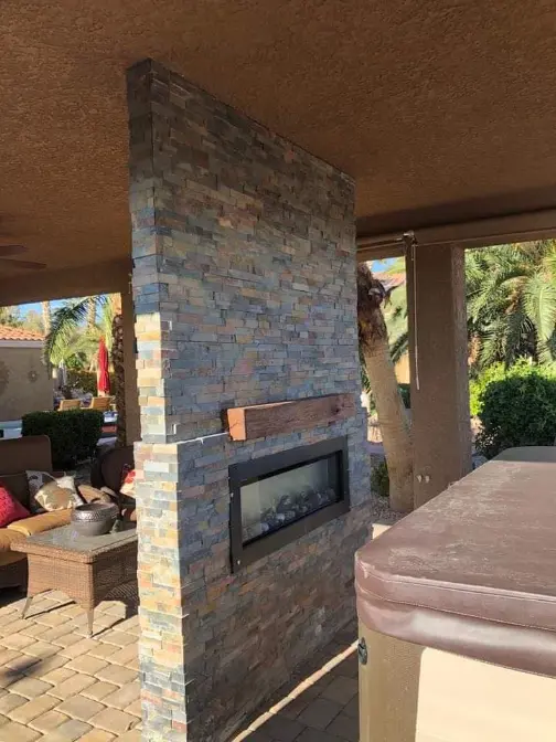 custom outdoor stone fireplace with gas fireplace wood mantle